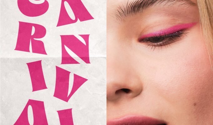Close up of young woman's face wearing bright pink eyeliner next to poster with pink lettering advertising Harrods H Beauty Carnival